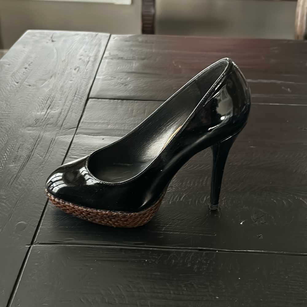 Size 4M Stuart Weitzman 4” Black Patent Pumps with Brown Woven Platform.